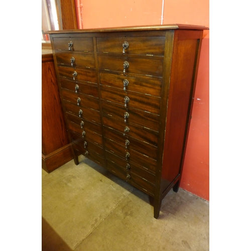 91 - An Edward VII mahogany twenty drawer music cabinet