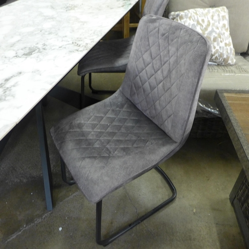 1440 - A Kos 130cm-180cm extending dining table with two grey velvet chairs and a bench * this lot is subje... 