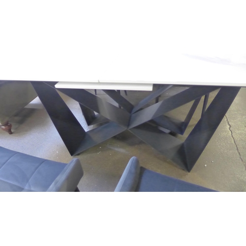 1441 - A Marvel 2m dining table and four Kos granite chairs * this lot is subject to VAT