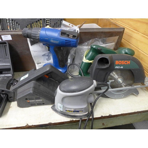 2004 - A box of power tools,  including a Draper drill 41571,a Bosch jigsaw 06033329042, Black and Decker s... 