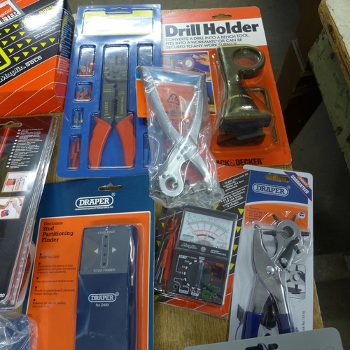 2015 - A quantity of DIY items, multi meter testers, boxed, a Black & Decker laser, wire brushes, a Halford... 