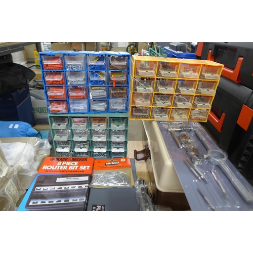 2019 - Plastic storage boxes with rawl plugs, screws and nails, Wilko netting staples, a plastic tool box w... 