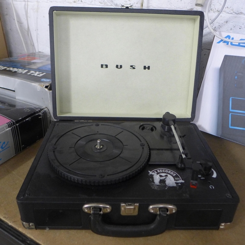 2136 - A Bush portable turntable record player and an Alesis keyboard