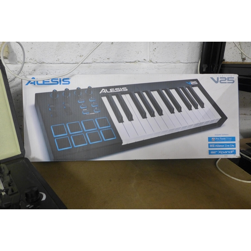 2136 - A Bush portable turntable record player and an Alesis keyboard