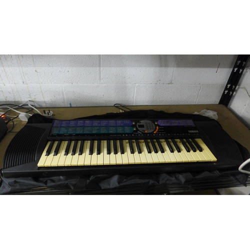 2141 - A Yamaha organ in case