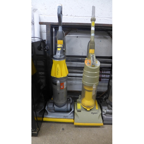 2168 - Two Dyson vacuum cleaners; Root Cyclone and DC01