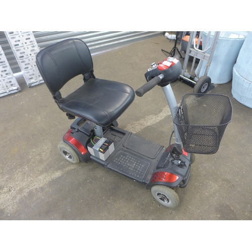 2236 - A TGA four wheeled electric wheelchair - W
