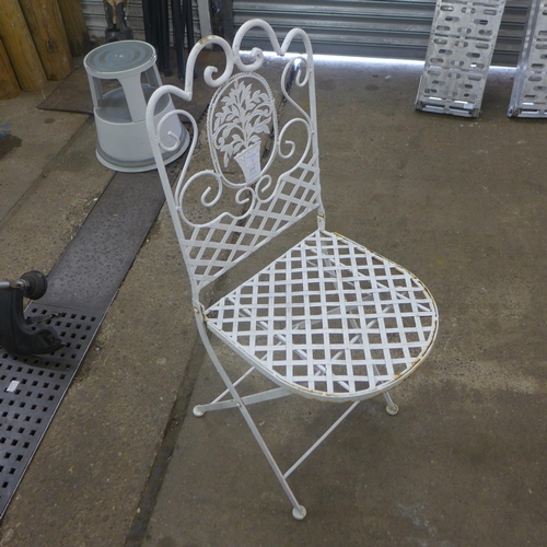 2245 - A white metal garden table and two chairs