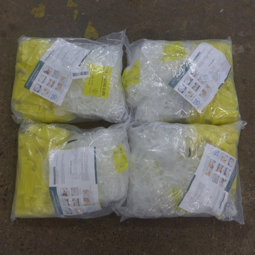 2254 - Four bags of tile levelling clips and spacers (50 clips and 50 spacers per bag)
