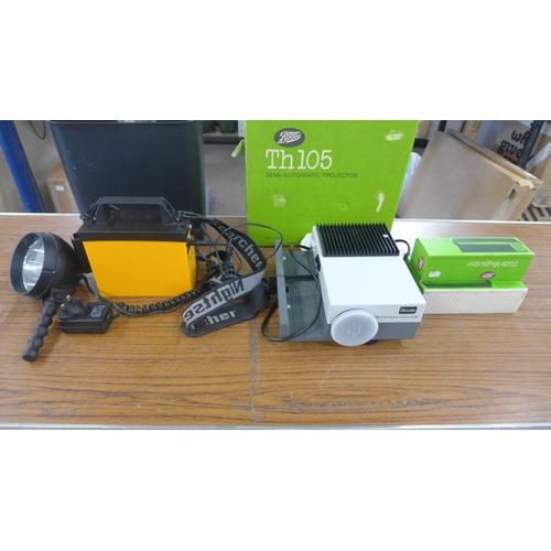 2336 - A flash light with battery pack and Boots TH105 semi automatic projector