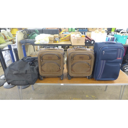 2363 - Two Kangol hand luggage suitcases, an Antler hand luggage suitcase and a Calpak luggage bag