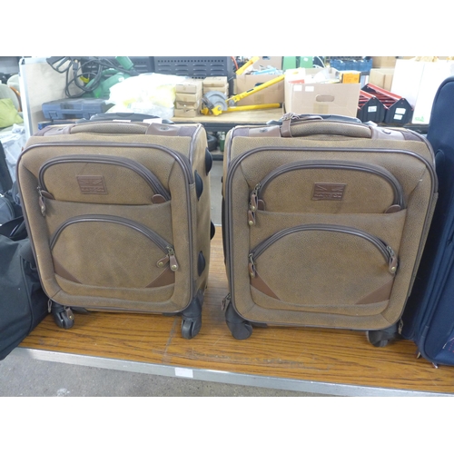 2363 - Two Kangol hand luggage suitcases, an Antler hand luggage suitcase and a Calpak luggage bag