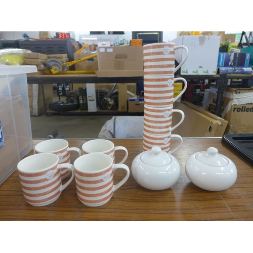 2366 - A large quantity of unused Waitrose pottery including stackable mugs, sugar pots, teapot, etc.