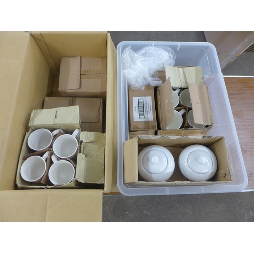 2366 - A large quantity of unused Waitrose pottery including stackable mugs, sugar pots, teapot, etc.