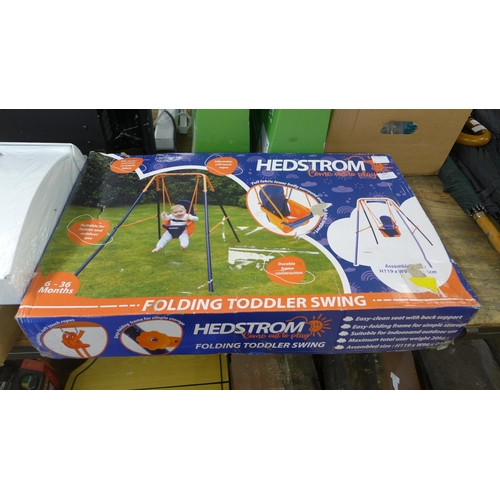 2377 - A Hedstrom folding toddler swing - boxed