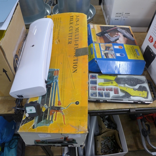 2383 - A Rapesco electric nail gun/stapler and a 3 in 1 tile cutter & laminator