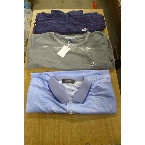 2386 - A quantity of clothing including shirts, a jacket and trousers