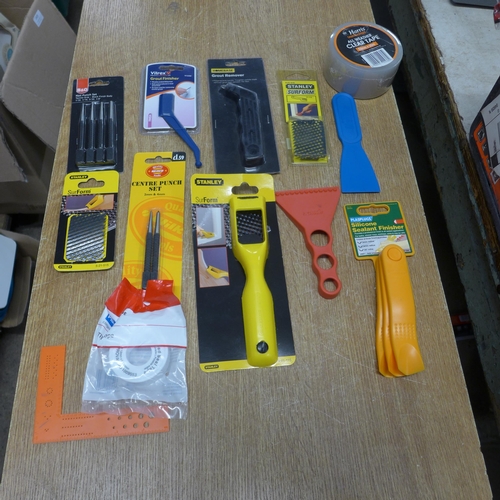 2388 - Stanley Surform items: Wickes and Wilko centre point punches, all weather clear tape, etc.