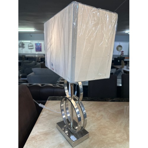 1413 - A nickel table lamp with white linen shade, H 70cms (EUBT65700LINWH44)