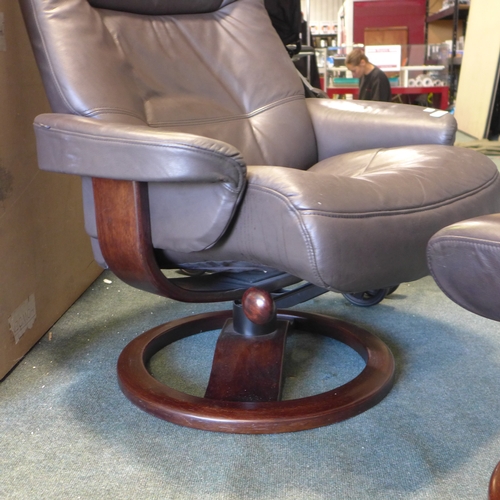 3062 - Brown swivel occasional chair and matching footstool