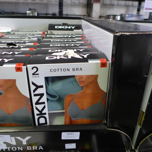 3091 - Quantity of ladies green and grey DKNY cotton bras - Size M  * This lot is subject to VAT