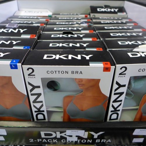 3092 - Quantity of ladies green and grey DKNY cotton bras - Size M  * This lot is subject to VAT