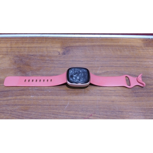 3152 - Fitbit Versa 4 Pink, original RRP £144.99 + VAT            (303-59) * This lot is subject to VAT