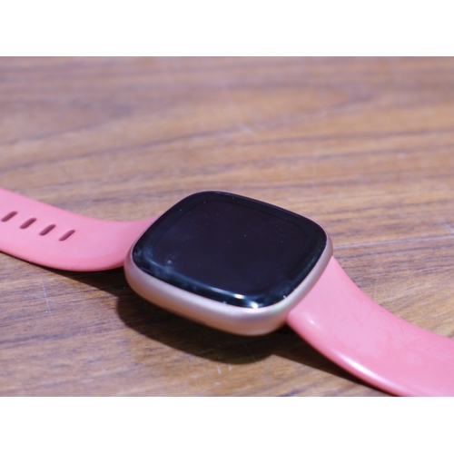 3152 - Fitbit Versa 4 Pink, original RRP £144.99 + VAT            (303-59) * This lot is subject to VAT