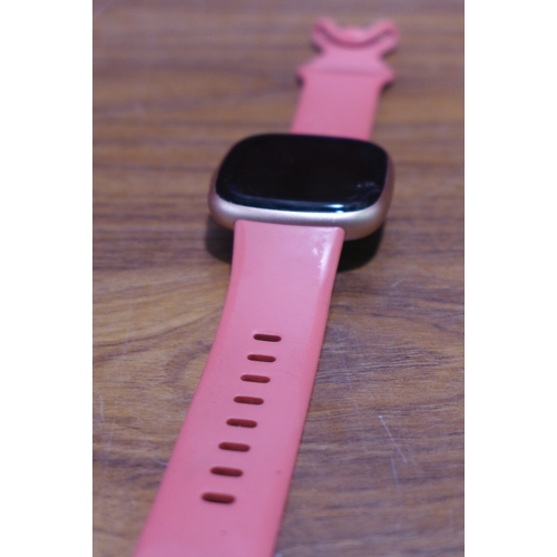 3152 - Fitbit Versa 4 Pink, original RRP £144.99 + VAT            (303-59) * This lot is subject to VAT