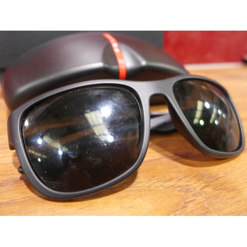 3164 - Prada Sport Black Plastic Sunglasses - Broken Arm - (303-64) * This lot is subject to VAT