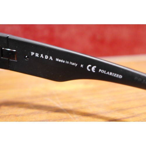 3177 - Prada Sport Black Plastic Polarized Sunglasses, original RRP £108.33 + VAT (303-283) * This lot is s... 