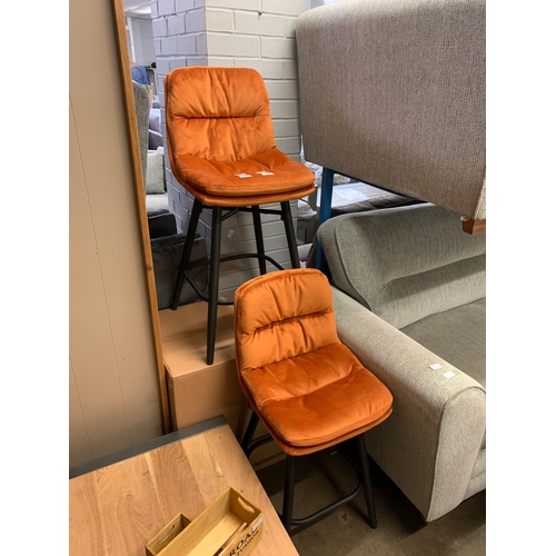 1422 - A pair of Enderson orange velvet bar stools, (boxed)