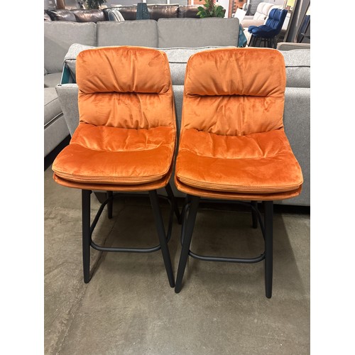 1423 - A pair of Endeson orange velvet bar stools