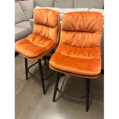 1423 - A pair of Endeson orange velvet bar stools