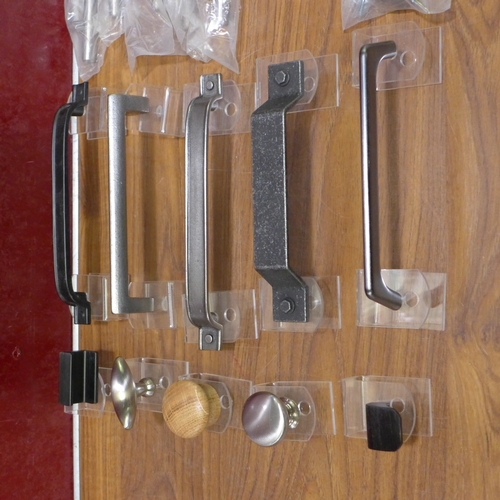 3163 - Quantity of Misc. Handles, and Four Ear Plug Dispensers * This lot is subject to VAT