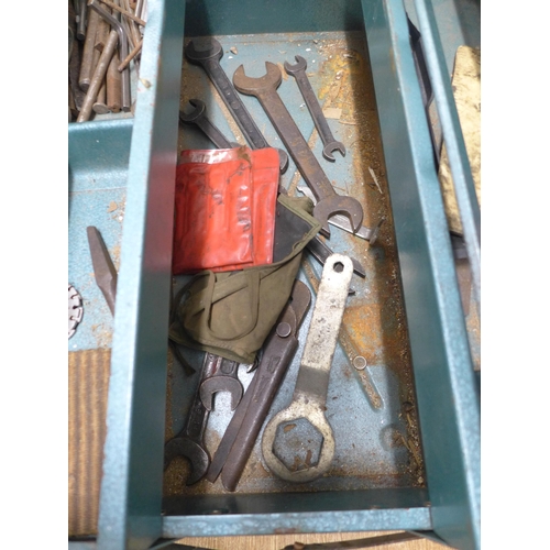 2034 - A metal tool box with assorted hand tools inc. spanners, pliers, screwdrivers, etc.