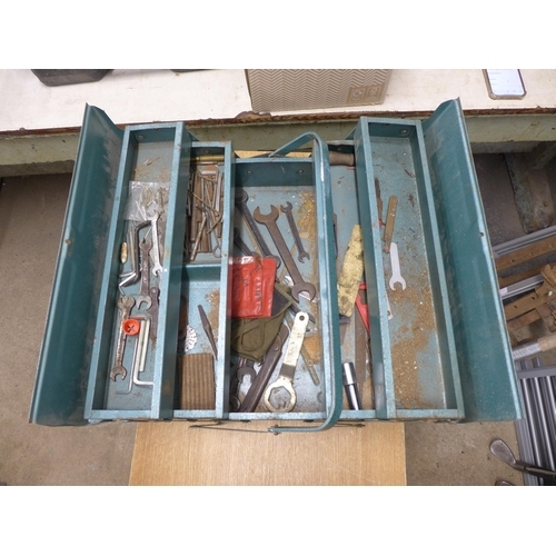 2034 - A metal tool box with assorted hand tools inc. spanners, pliers, screwdrivers, etc.