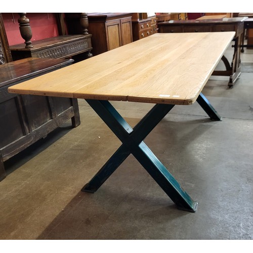 93 - A large French style ash and green metal x-frame refectory table, 76cms h, 213cms l, 81cms w