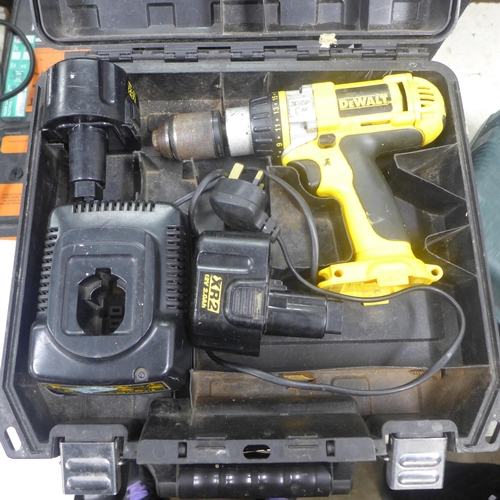 2009 - A DeWalt hammer drill with two batteries and charger in case (model no. DW981 XRP)