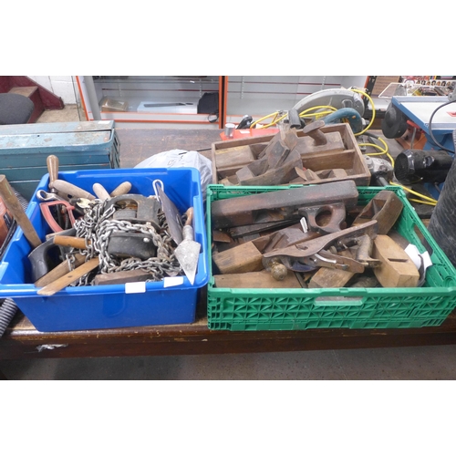 2030 - A box of assorted hand tools including chain winch, saws, axes etc. and a box of wooden block planes