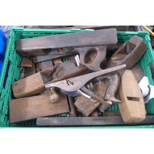 2030 - A box of assorted hand tools including chain winch, saws, axes etc. and a box of wooden block planes