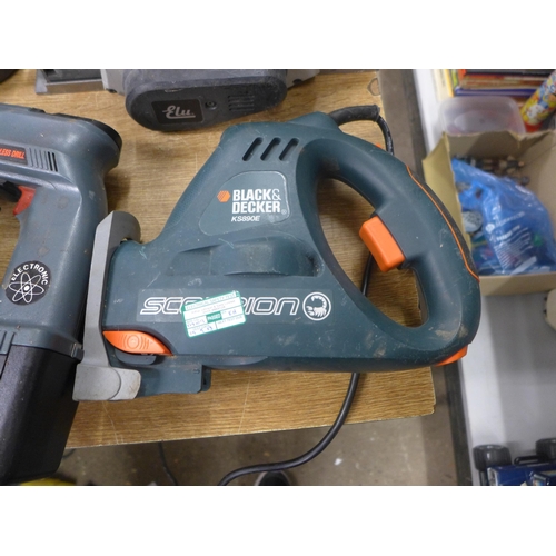 2048 - A quantity of power tools and other items including a Halfords fully automatic battery charger, a De... 