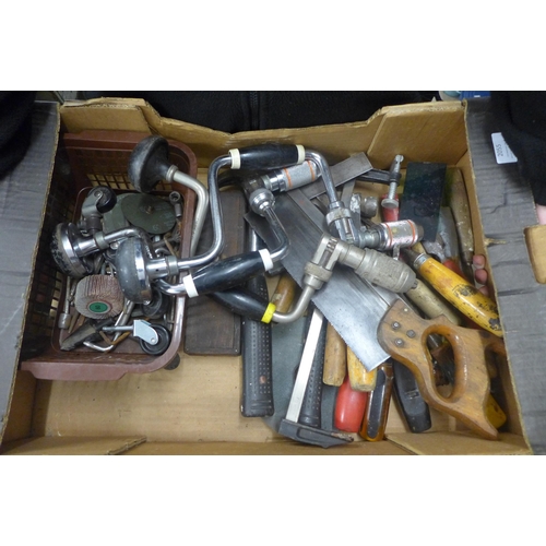 2055 - A box of saws, tools, Arga hand drills, etc.