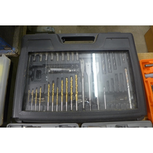 2057 - A quantity of drill bits, nuts, bolts, electric connectors and tool kits