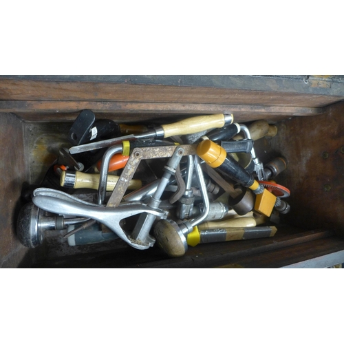 2061 - A wooden box of hand tools including hand drills, an SB 3 Stanley plane etc