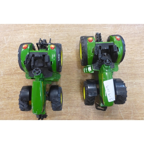 2118 - Two die-cast model John Deere tractors