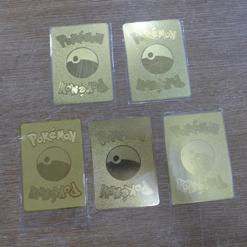 2126 - Five metal gold-coloured Pokemon cards