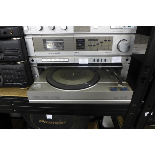 2183 - A Toshiba stereo sound system, inc:- stereo tuner, soft-touch cassette deck, front-sliding stereo tu... 