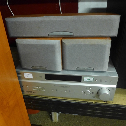 2193 - A Sony STR-DE400 and five speakers- one centre two book case and two tower speakers