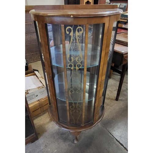 184A - A walnut single door display cabinet